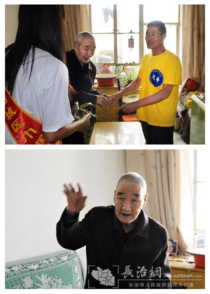 nEO_IMG_11今年82岁的老人王继云曾经参加过抗美援朝战役，如今与老伴一起生活，工作人员将粽子与节日的祝福，送给两位老人.jpg